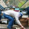 th_prdp-staff-unloading-honey-bee-colonies-from-vehicle-for-distribution-to-the-traineess-of-the-training-2-1.jpg