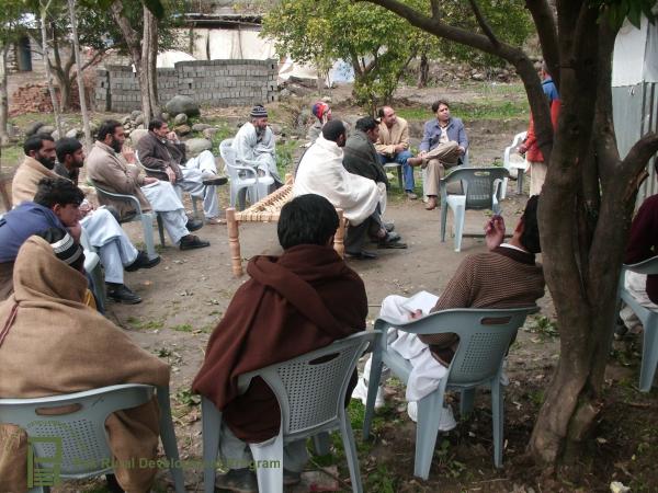 program-director-in-a-community-meeting.JPG